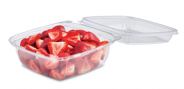 Clear plastic containers, one filled with sliced strawberries and one empty