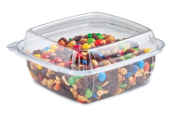 Clear plastic container filled with trail mix and colorful candy-coated chocolates