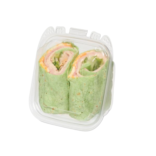 Two green tortilla wraps with lettuce and sliced fillings in a clear plastic container