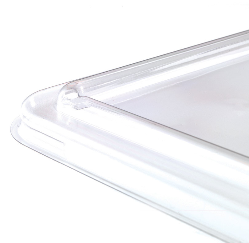 Close-up of a clear plastic tray with raised edges