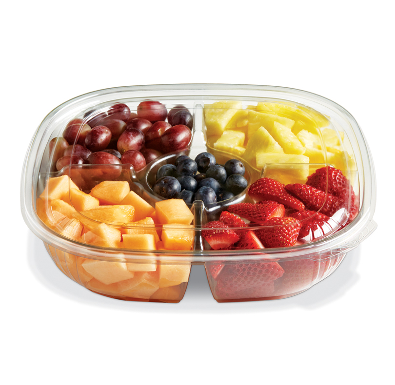 Compartmentalized tray of grapes, pineapple, cantaloupe, blueberries, and strawberries