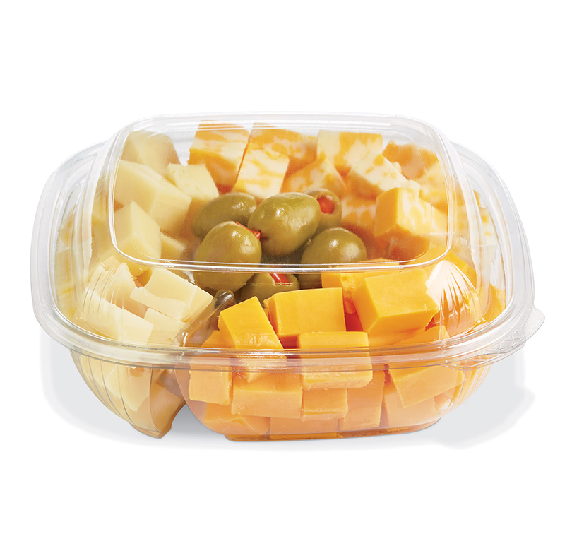 Clear container of assorted cubed cheeses and green olives
