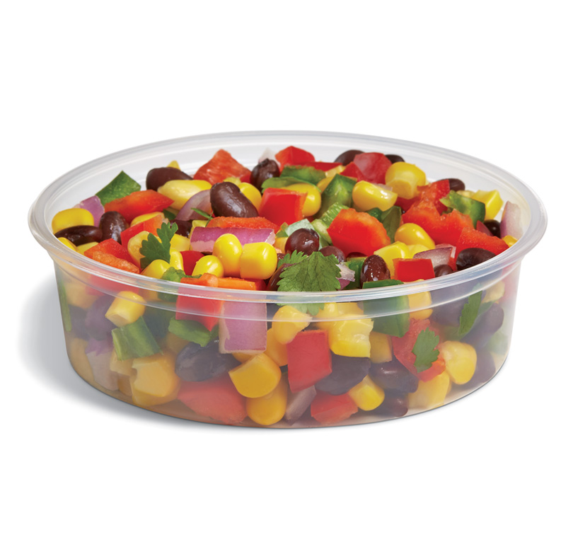 Black bean and corn salad with diced bell peppers, red onion, and cilantro in a clear container