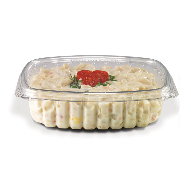 Container of creamy macaroni salad topped with tomato and herbs