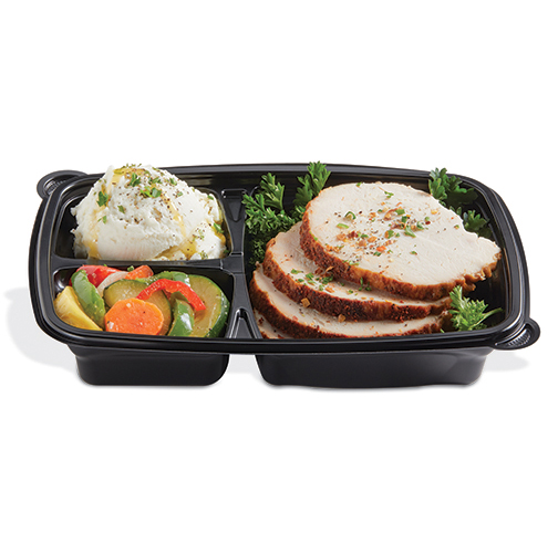Meal tray with sliced chicken, mashed potatoes, and mixed vegetables