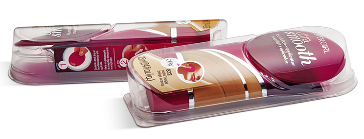 Two burgundy-and-gold beauty products displayed in clear plastic packaging