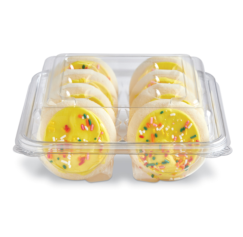 Clear container of yellow-frosted cookies topped with colorful sprinkles