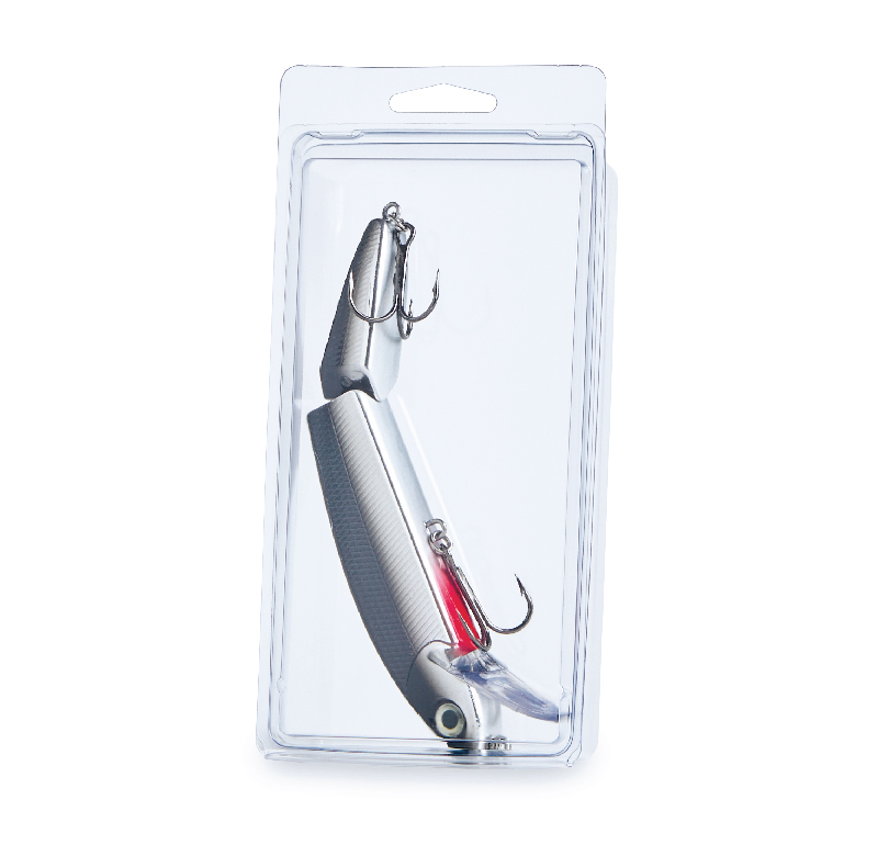 Fishing lure in clear blister packaging with treble hooks and red detailing