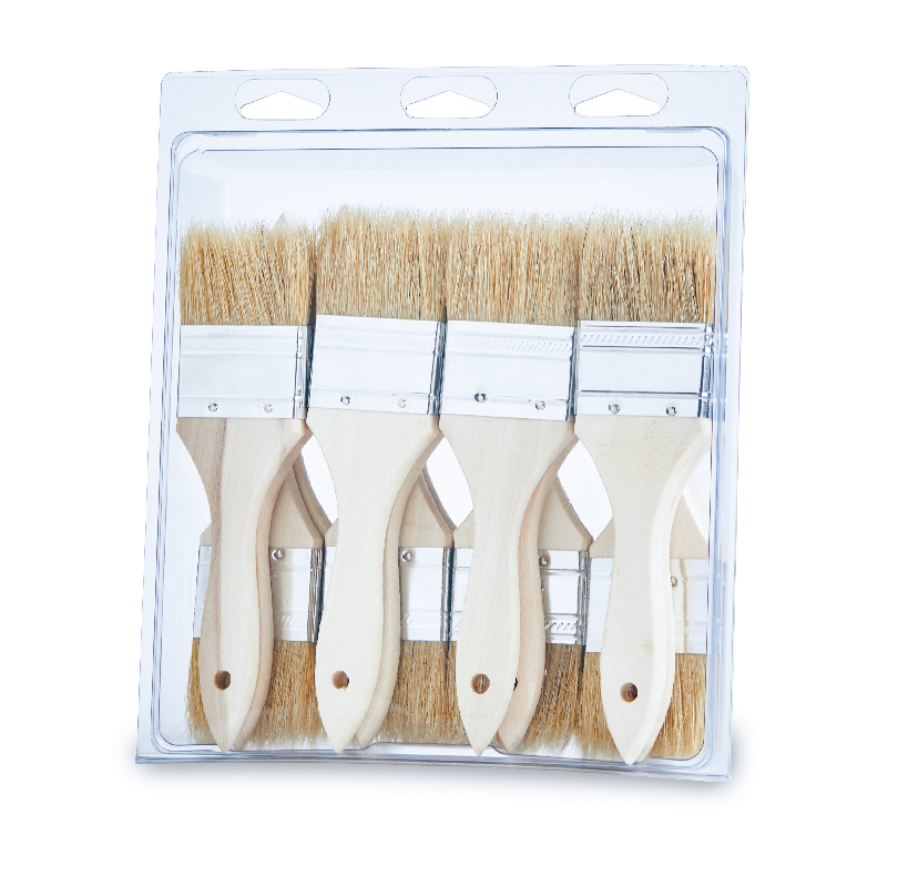 Four paintbrushes in clear plastic packaging