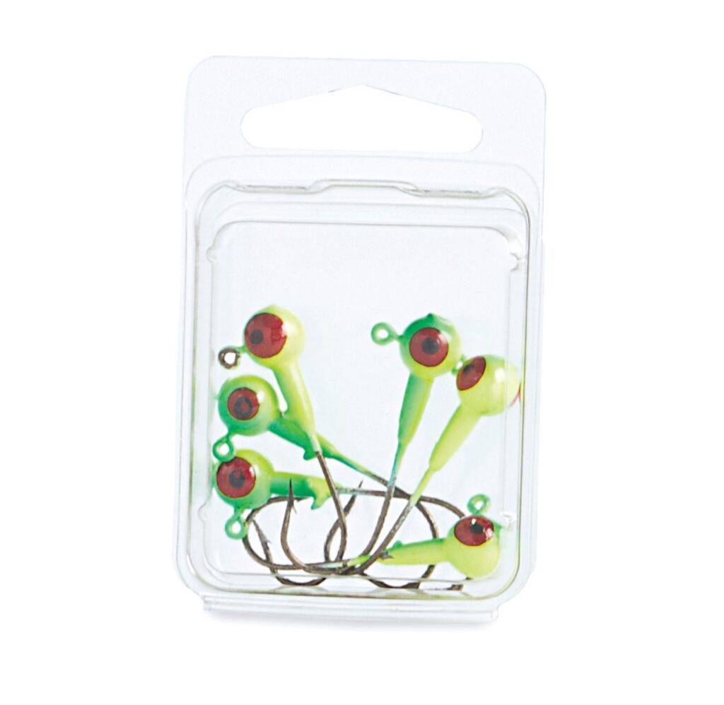 Package containing several green frog-shaped decorative pieces with red eyes and brown wire legs