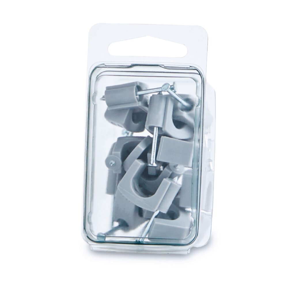 Gray mechanical instrument in clear plastic blister packaging