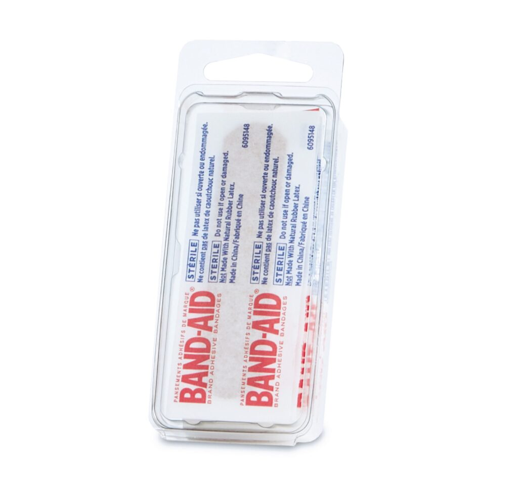 Pack of BAND-AID adhesive bandages in clear plastic packaging