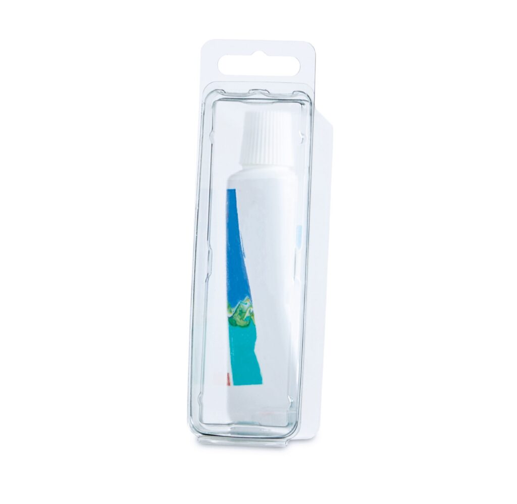 Blue and turquoise item in clear plastic blister packaging