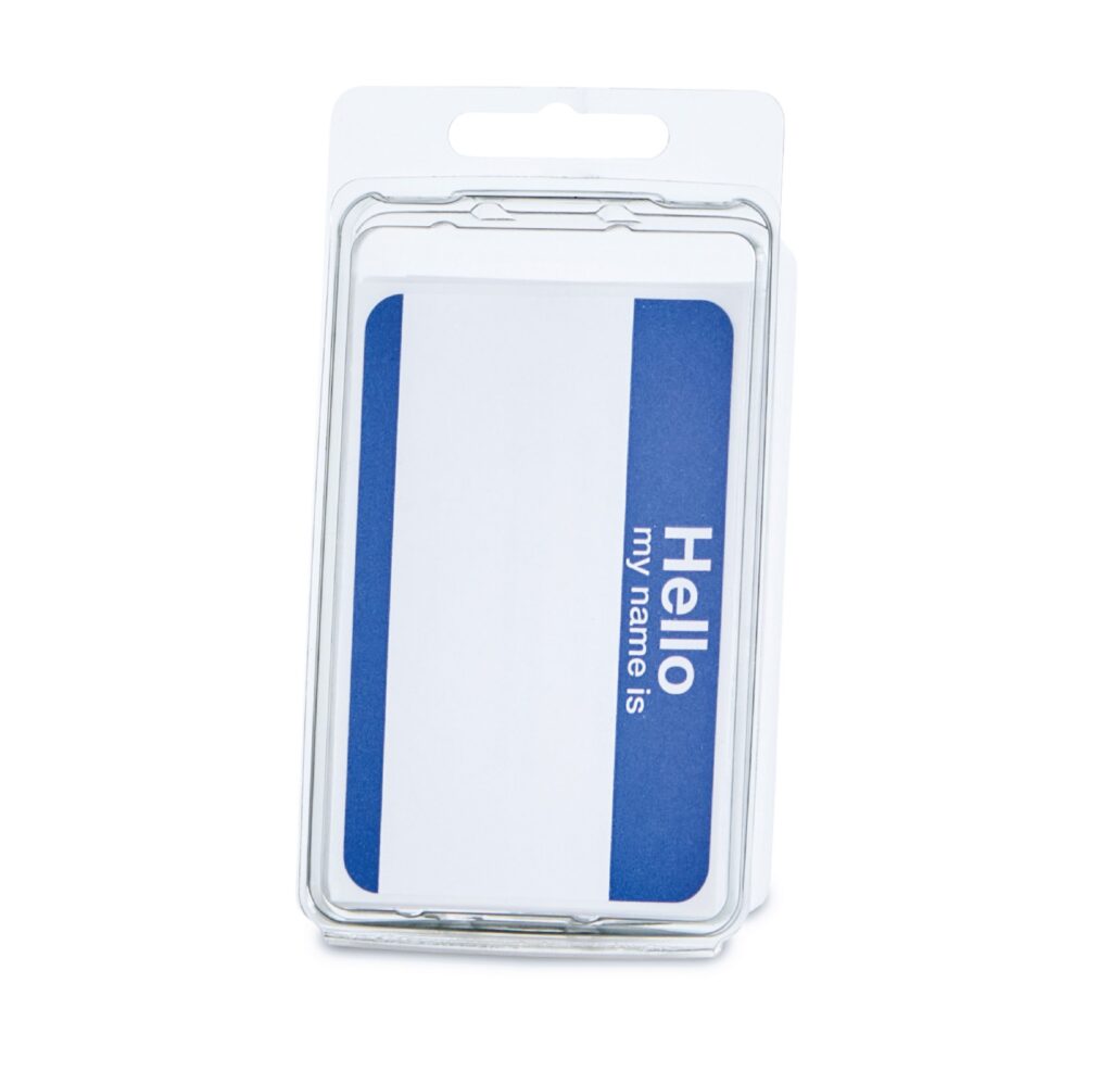 Clear plastic name badge holder containing a blank “Hello my name is” name tag