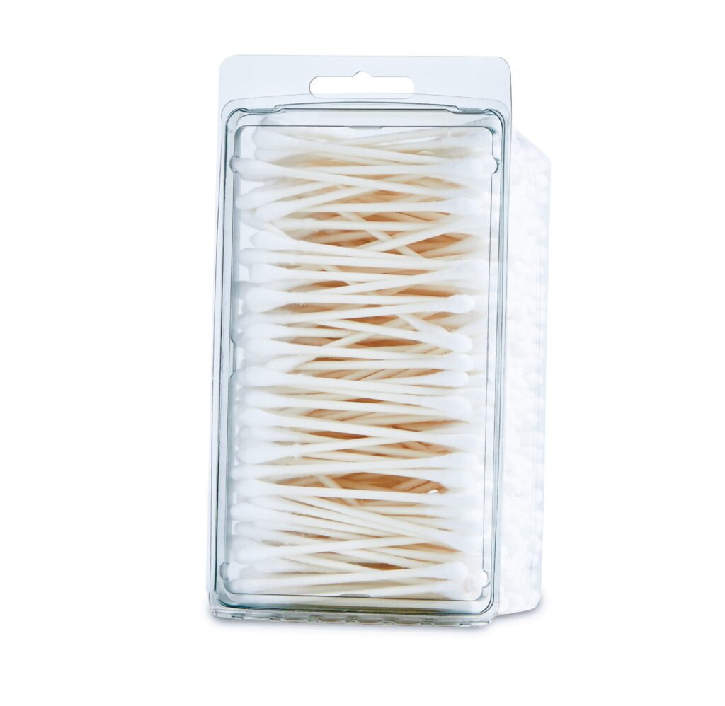 Package of cotton swabs in a clear plastic container