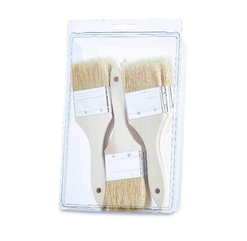 Three paintbrushes with wooden handles in a clear plastic package