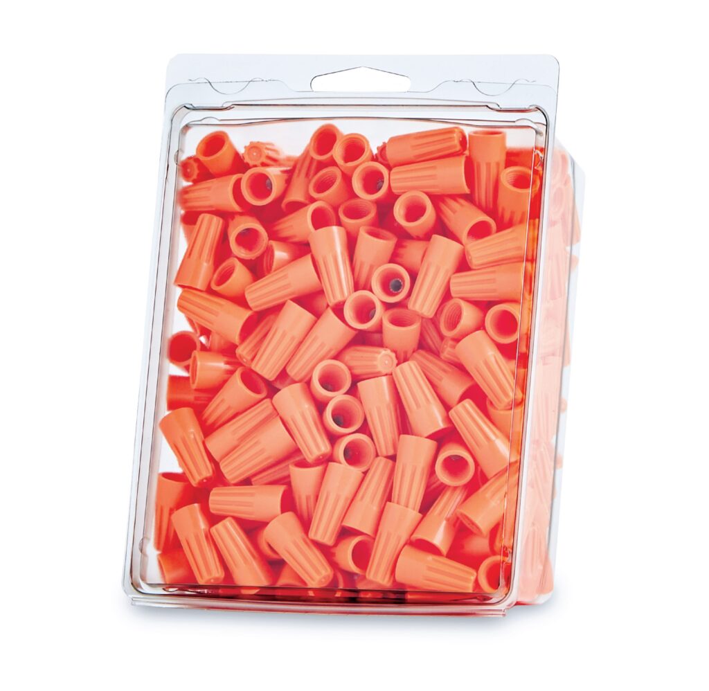 Transparent package filled with orange rigatoni pasta tubes