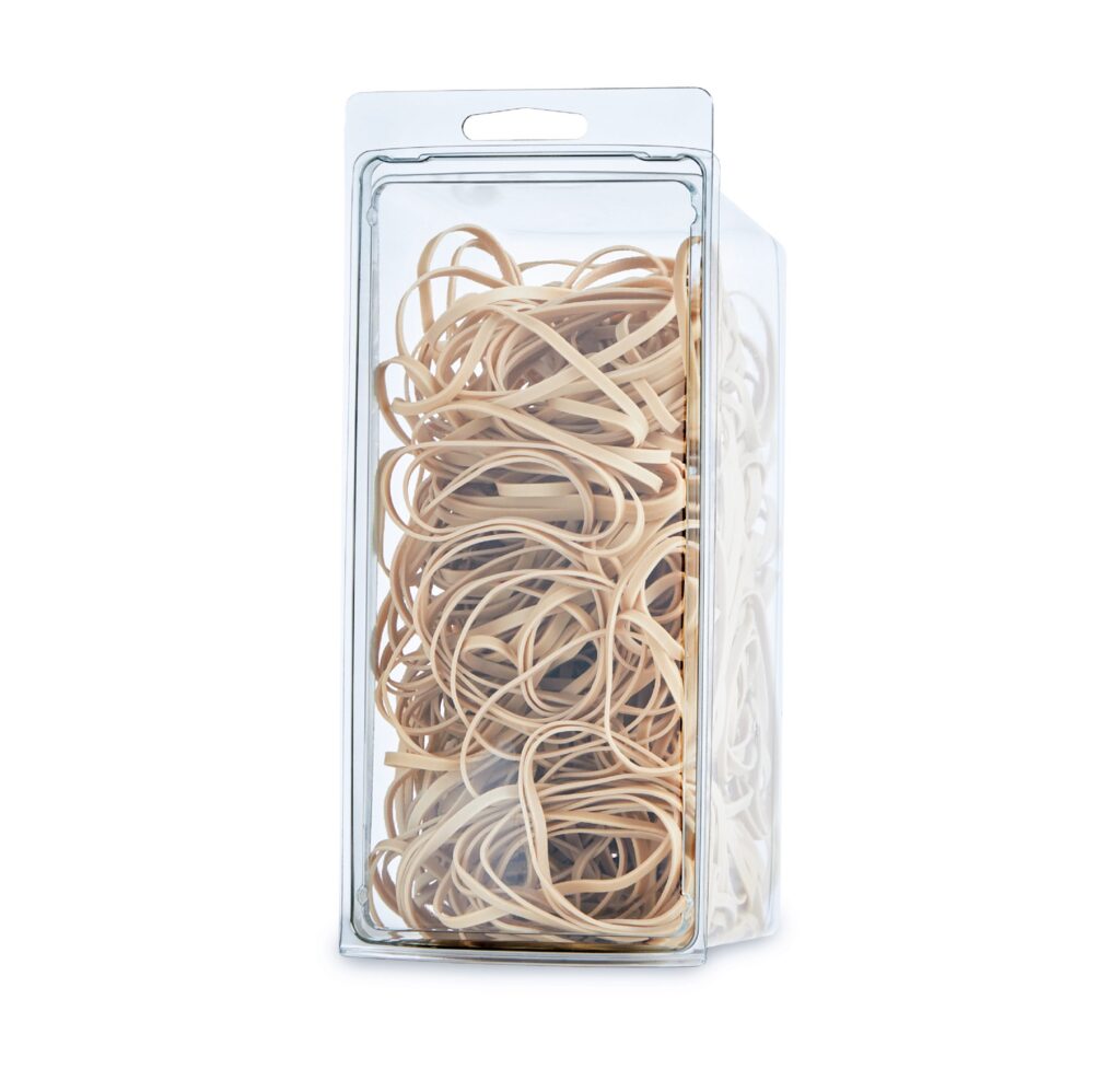 Transparent container filled with beige rubber bands