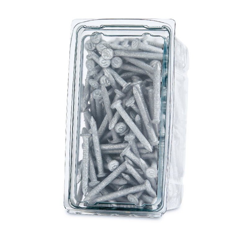 Glass container filled with metal screws