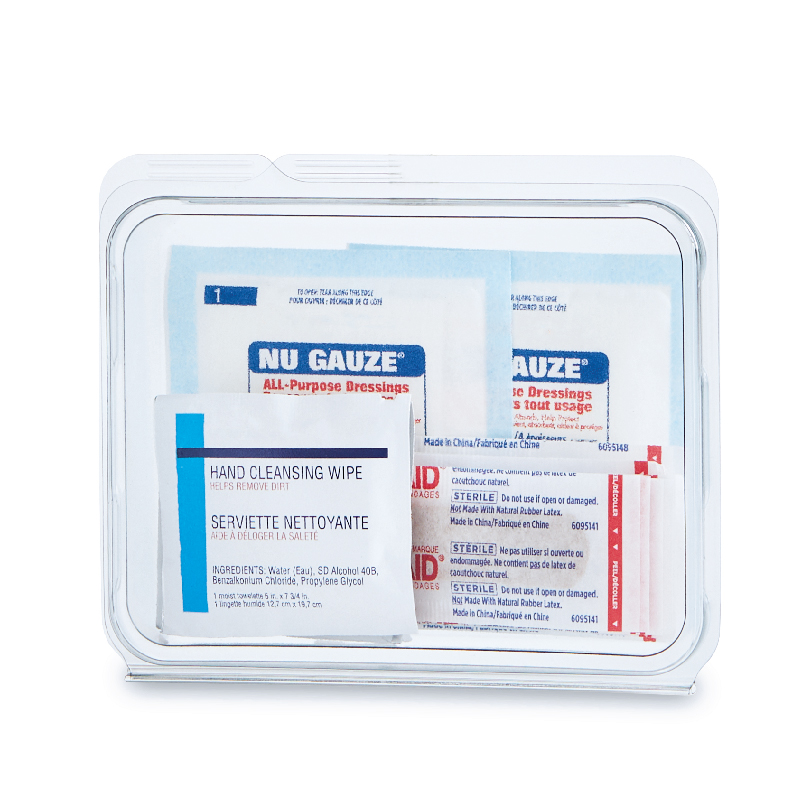 Clear package containing a hand cleansing wipe and NU GAUZE all-purpose dressings