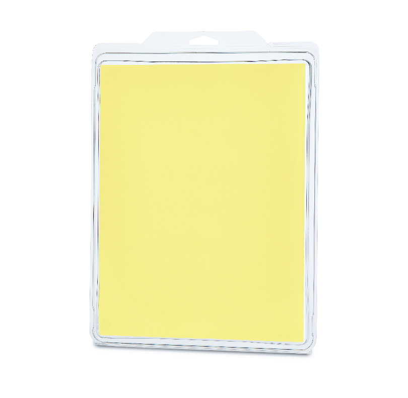 Yellow notepad in clear plastic packaging