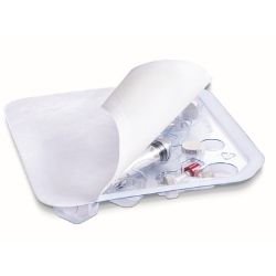 Open medical kit with syringes and other sterile supplies partially covered by a white sheet